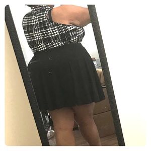 Sleeveless black and white bodysuit